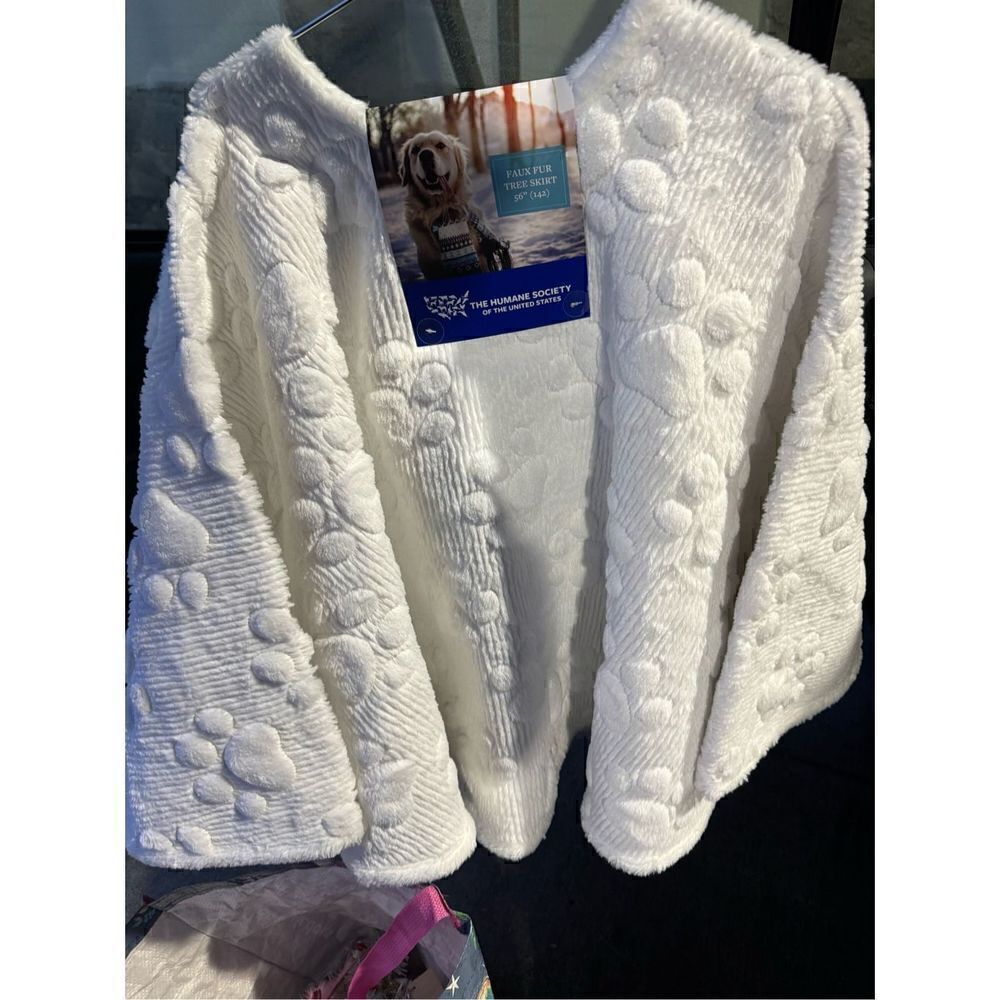 Humane society white faux fur paw print tree skirt